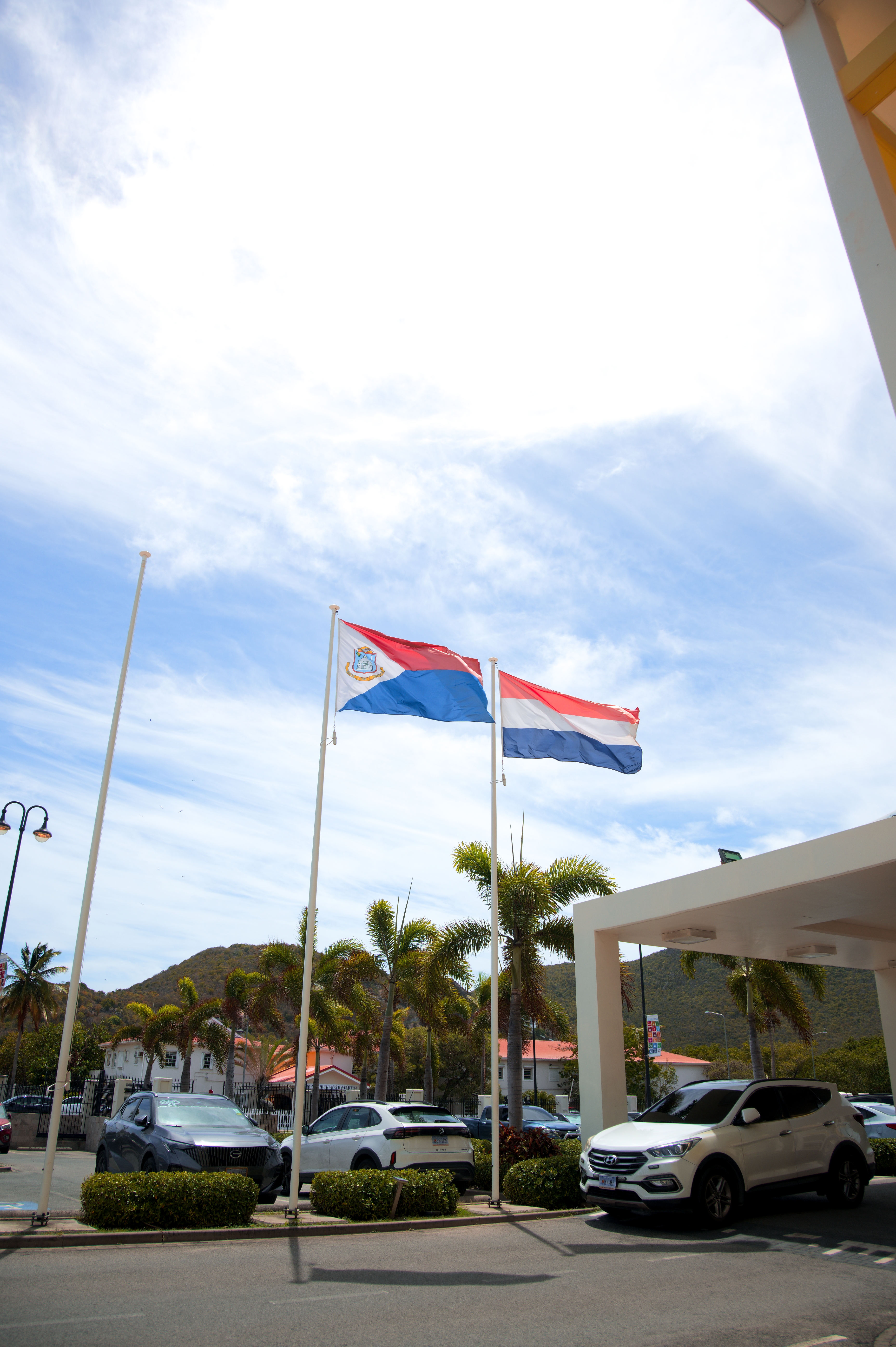 The flags of Sint Maarten and the Kingdom of the Netherlands outside the Government Administration Building